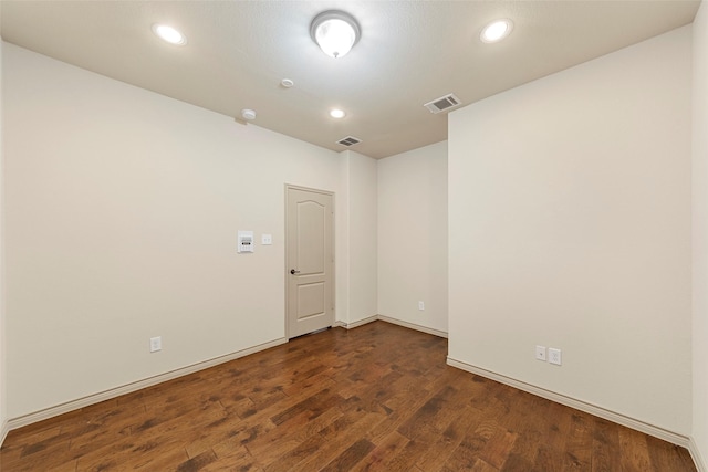 7941 Parkwood Blvd, Plano, TX 75024 - spare room with dark wood-style flooring, recessed lighting, and baseboards
