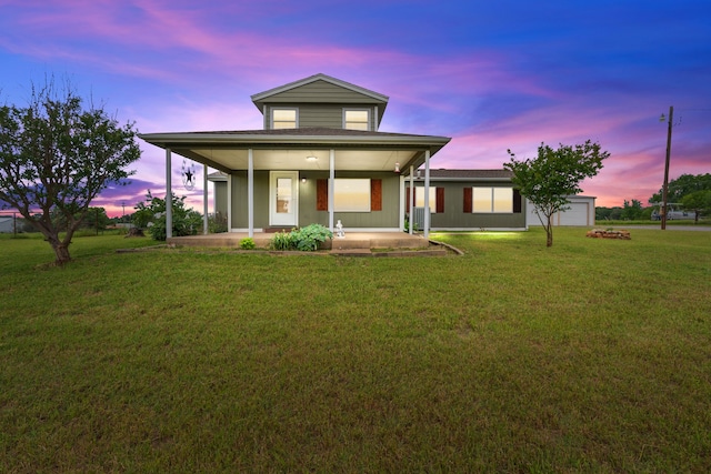 560 N Cardinal Rd, Reno, TX 76020 - view of front of house with a front lawn and covered porch