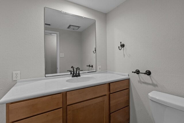 560 N Cardinal Rd, Reno, TX 76020 - half bathroom with vanity and toilet