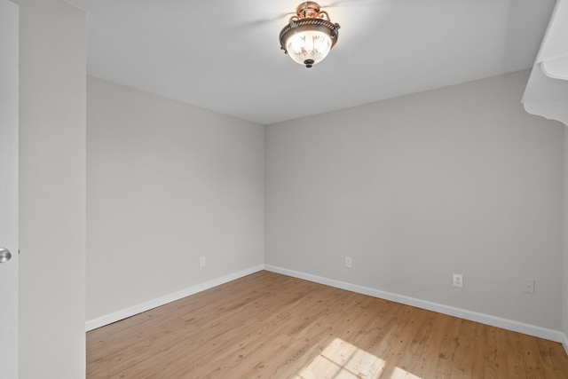 560 N Cardinal Rd, Reno, TX 76020 - empty room with wood finished floors and baseboards