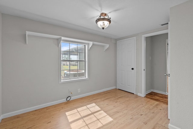 560 N Cardinal Rd, Reno, TX 76020 - spare room featuring wood finished floors and baseboards