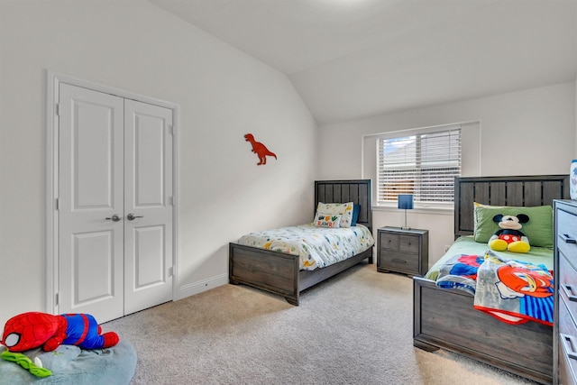716 Newberry Ln, Royse City, TX 75189 - carpeted bedroom with vaulted ceiling, a closet, and baseboards
