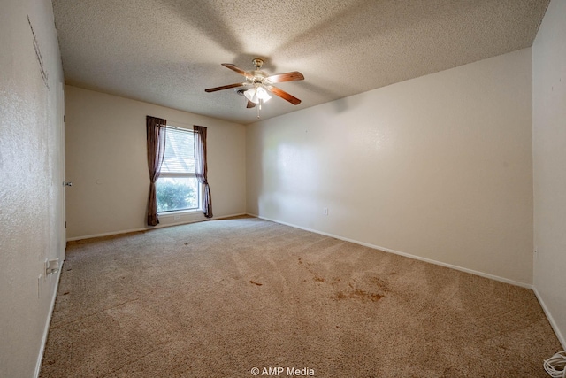 3226 Whitewing Way, Abilene, TX 79606 - carpeted empty room featuring a ceiling fan, a textured ceiling, and baseboards