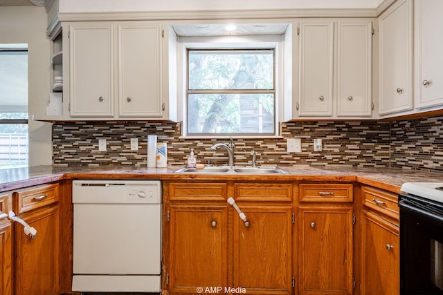 3226 Whitewing Way, Abilene, TX 79606 - kitchen with dishwasher, a sink, tasteful backsplash, open shelves, and white cabinets