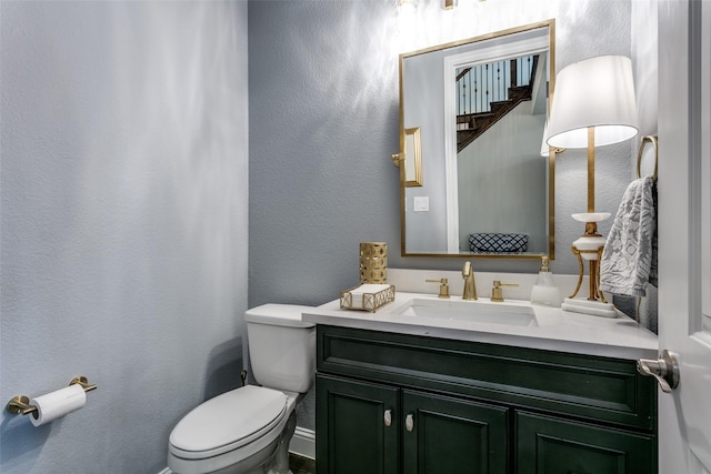 1801 Wichita Dr, Prosper, TX 75078 - bathroom with toilet, vanity, and a textured wall