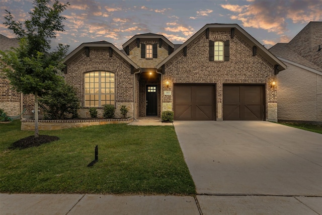 14824 Belclaire Ave, Aledo, TX 76008 - view of front of property featuring brick siding, concrete driveway, a yard, and a shingled roof