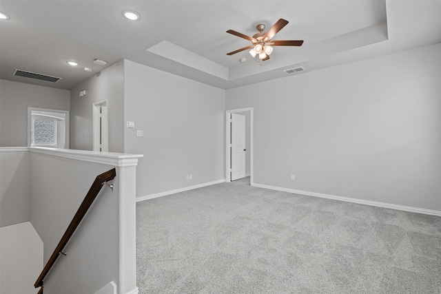 14824 Belclaire Ave, Aledo, TX 76008 - spare room with carpet flooring, recessed lighting, baseboards, a tray ceiling, and a ceiling fan