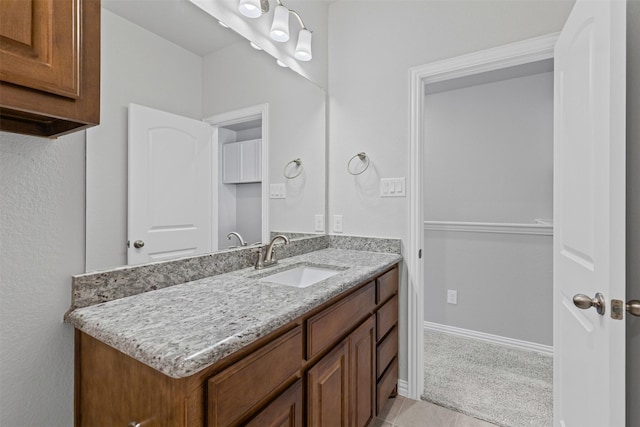 14824 Belclaire Ave, Aledo, TX 76008 - bathroom featuring vanity and baseboards