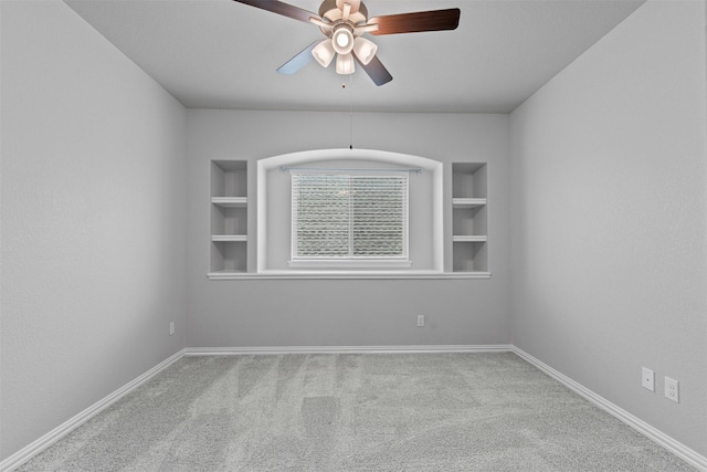 14824 Belclaire Ave, Aledo, TX 76008 - spare room featuring ceiling fan, carpet, baseboards, and built in shelves
