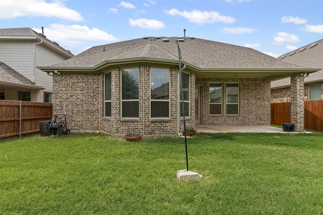 14824 Belclaire Ave, Aledo, TX 76008 - back of house featuring brick siding, a patio, and roof with shingles