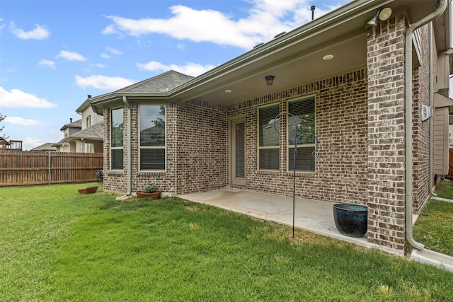 14824 Belclaire Ave, Aledo, TX 76008 - view of property exterior with brick siding and a patio area