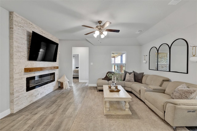 3708 Bennett Trl, Celina, TX 75009 - living room with wood finished floors, a fireplace, baseboards, and ceiling fan