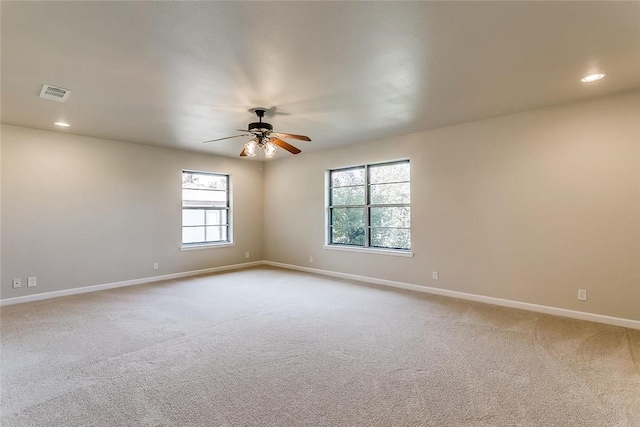 1200 County Road 701a, Cleburne, TX 76031 - spare room featuring light colored carpet, baseboards, a ceiling fan, and recessed lighting