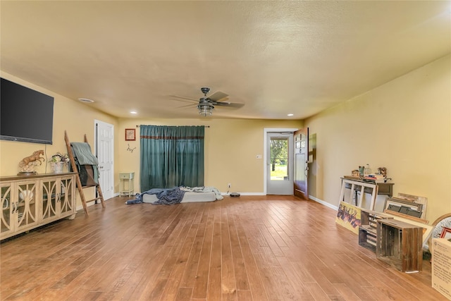 1200 County Road 701a, Cleburne, TX 76031 - living room with a ceiling fan, wood finished floors, baseboards, and recessed lighting