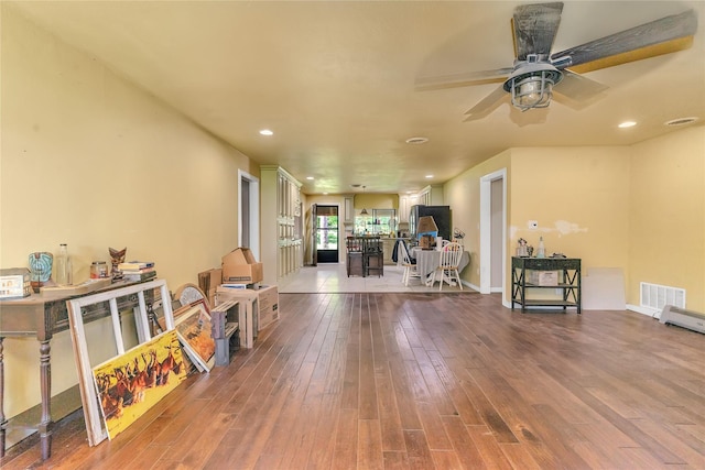 1200 County Road 701a, Cleburne, TX 76031 - living area featuring wood-type flooring, a ceiling fan, recessed lighting, and baseboards