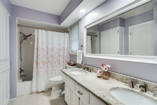 1835 Hatherly Dr, Plano, TX 75023 - full bathroom featuring toilet, double vanity, shower / bath combination with curtain, and wood finished floors