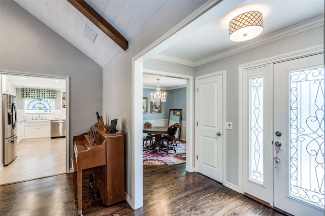 1835 Hatherly Dr, Plano, TX 75023 - entryway featuring a chandelier, light wood-style floors, and crown molding