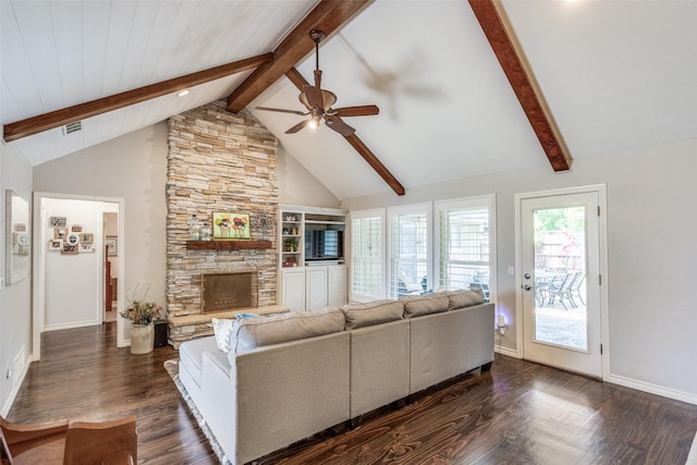 1835 Hatherly Dr, Plano, TX 75023 - living area featuring a ceiling fan, beamed ceiling, dark wood-style flooring, a stone fireplace, and baseboards