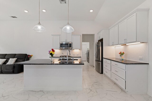 1309 Haybale Ln, Garland, TX 75042 - kitchen featuring stainless steel appliances, a sink, white cabinets, light marble finish flooring, and recessed lighting