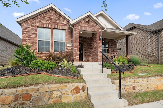 1309 Haybale Ln, Garland, TX 75042 - view of front facade with brick siding