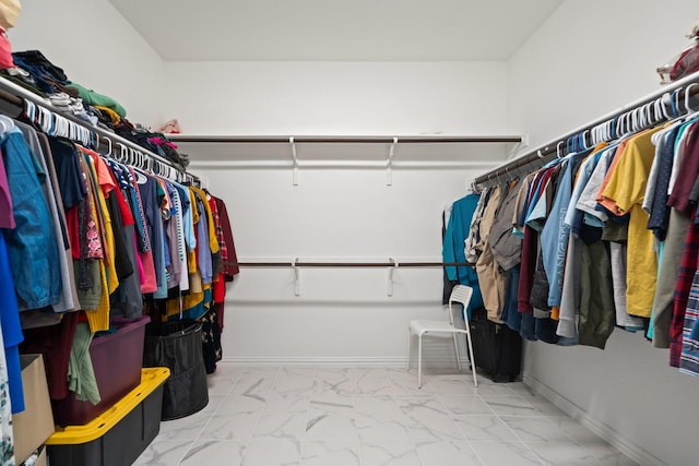 1309 Haybale Ln, Garland, TX 75042 - spacious closet featuring marble finish floors
