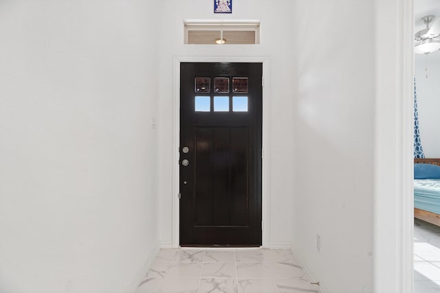 1309 Haybale Ln, Garland, TX 75042 - entrance foyer featuring light marble finish floors and baseboards