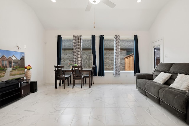 1309 Haybale Ln, Garland, TX 75042 - living room with vaulted ceiling, marble look tile flooring, a ceiling fan, baseboards, and recessed lighting
