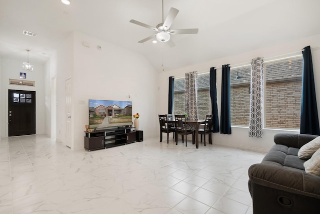 1309 Haybale Ln, Garland, TX 75042 - living area featuring marble finish flooring, ceiling fan, baseboards, and high vaulted ceiling