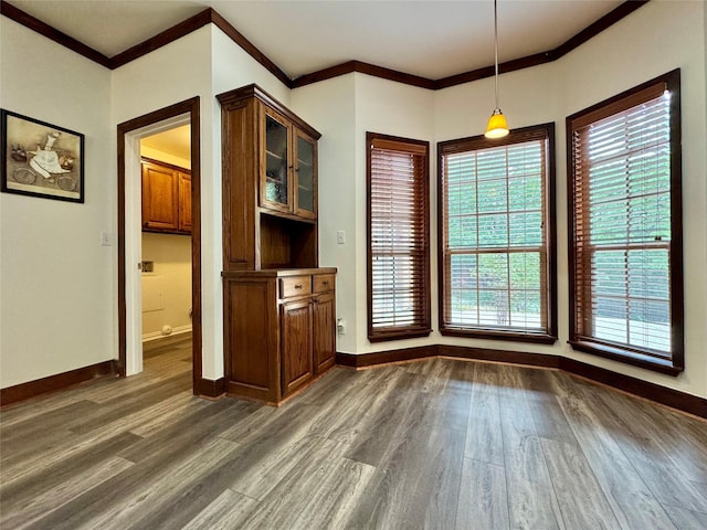 118 Hacienda Dr, Pottsboro, TX 75076 - unfurnished dining area with dark wood-style floors, ornamental molding, and baseboards