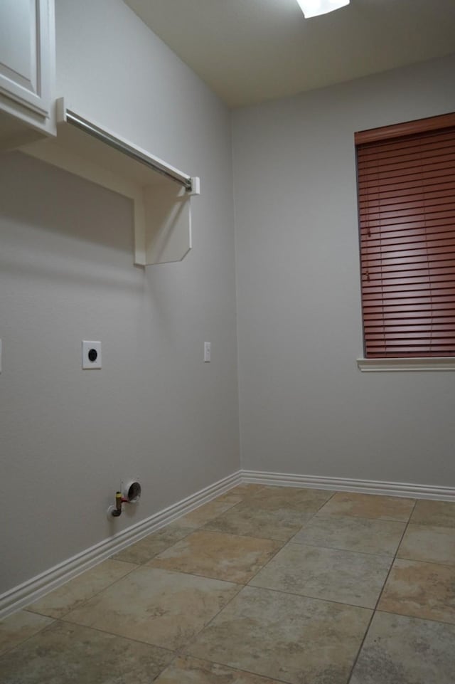 1136 Philip Dr, Allen, TX 75013 - laundry room featuring baseboards, hookup for a gas dryer, and hookup for an electric dryer