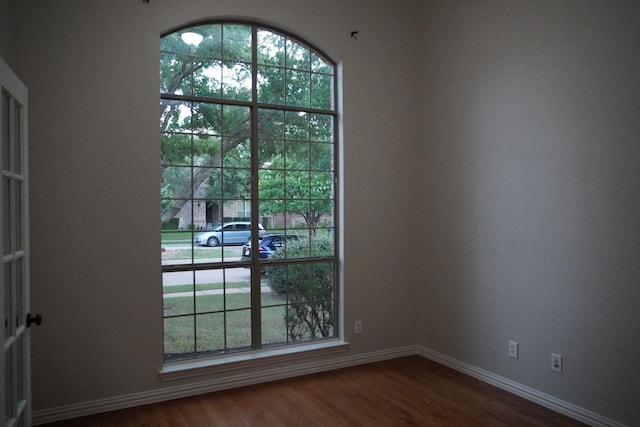 1136 Philip Dr, Allen, TX 75013 - spare room with dark wood-style flooring and baseboards