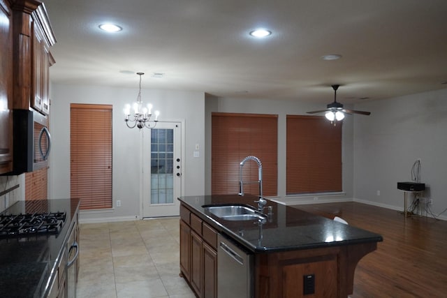 1136 Philip Dr, Allen, TX 75013 - kitchen featuring a sink, black gas cooktop, recessed lighting, stainless steel dishwasher, and baseboards