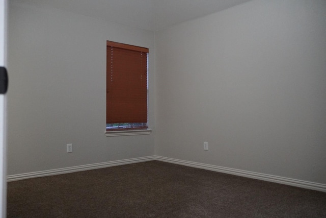 1136 Philip Dr, Allen, TX 75013 - spare room with dark carpet and baseboards