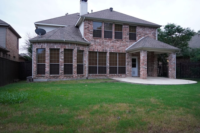 1136 Philip Dr, Allen, TX 75013 - back of property with a patio, brick siding, a chimney, and a shingled roof
