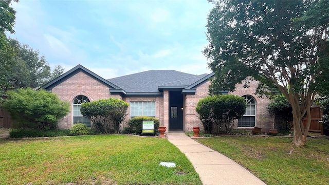 922 Mustang Dr, Allen, TX 75002 - view of front facade featuring brick siding and a shingled roof