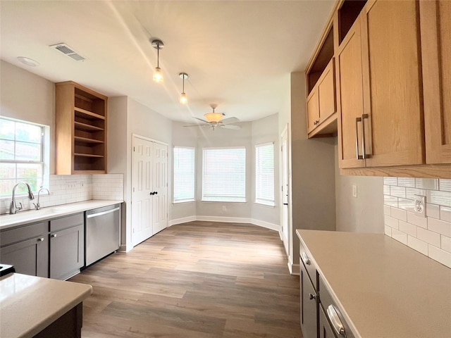922 Mustang Dr, Allen, TX 75002 - kitchen featuring stainless steel dishwasher, open shelves, a sink, and decorative backsplash