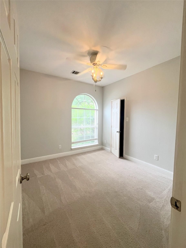 922 Mustang Dr, Allen, TX 75002 - spare room featuring light colored carpet, ceiling fan, and baseboards