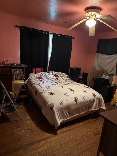 1505 S Austin St, Sherman, TX 75090 - bedroom featuring wood finished floors and ceiling fan