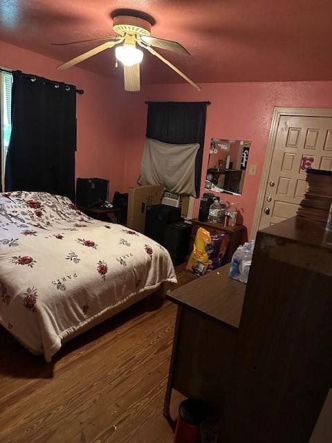 1505 S Austin St, Sherman, TX 75090 - bedroom featuring wood finished floors and a ceiling fan
