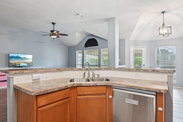5729 Brazos Dr, Haltom City, TX 76137 - kitchen with dishwasher, a sink, open floor plan, light countertops, and brown cabinets