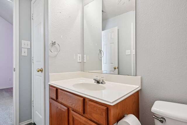 5729 Brazos Dr, Haltom City, TX 76137 - half bath featuring toilet and vanity