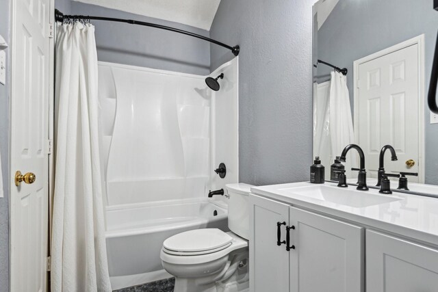 5729 Brazos Dr, Haltom City, TX 76137 - full bath with a textured wall, toilet, vanity, and shower / bathtub combination with curtain