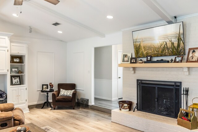 332 Azalea Dr, Sulphur Springs, TX 75482 - living room with light wood finished floors, a fireplace, a ceiling fan, and baseboards