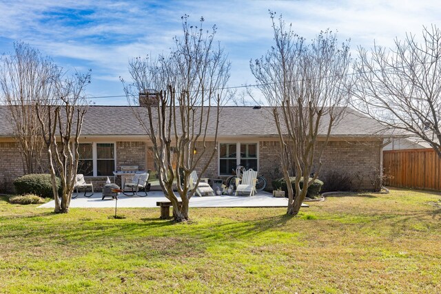332 Azalea Dr, Sulphur Springs, TX 75482 - rear view of property featuring a patio, brick siding, a chimney, and roof with shingles