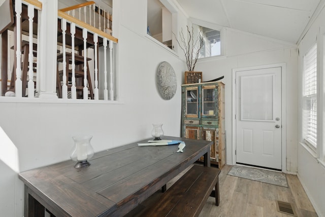306 Chism Trl, Gordon, TX 76453 - dining space featuring wood finished floors and lofted ceiling