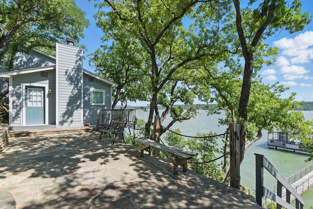 306 Chism Trl, Gordon, TX 76453 - view of patio / terrace with a water view
