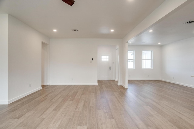171 Tryall Ct, Runaway Bay, TX 76426 - unfurnished living room with light wood finished floors, recessed lighting, baseboards, and ceiling fan
