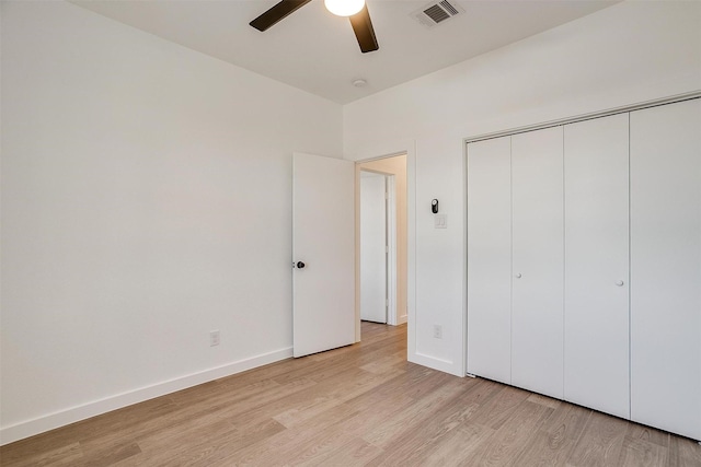 171 Tryall Ct, Runaway Bay, TX 76426 - unfurnished bedroom with light wood finished floors, a closet, baseboards, and a ceiling fan