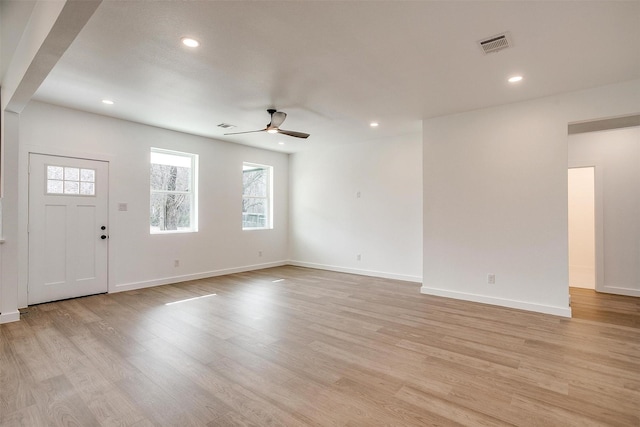 171 Tryall Ct, Runaway Bay, TX 76426 - unfurnished living room with ceiling fan, light wood-style floors, recessed lighting, and baseboards