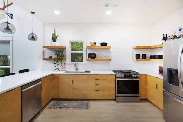 142 Wales Dr, Pottsboro, TX 75076 - kitchen featuring open shelves, stainless steel appliances, a sink, light wood-type flooring, and recessed lighting